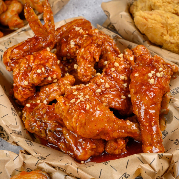 Close-up of crispy glazed chicken wings